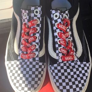Kid’s checkered vans.